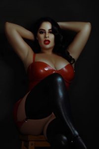 Latex Mistress all in Read and black boots